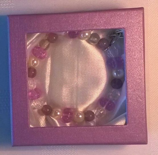 Purple and White Beaded Bracelet in Closed Box