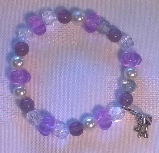Purple and white beaded bracelet