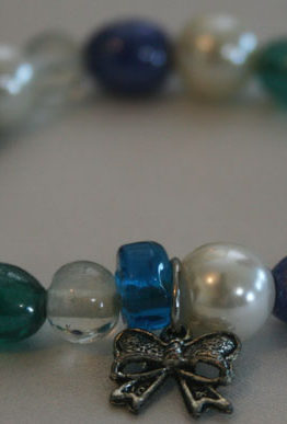 Blue, white and green beaded bracelet