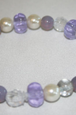 Purple and white beaded bracelet