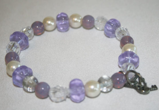 Purple and white beaded bracelet