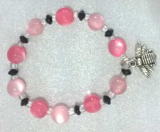 Beaded bracelet in pink, white and black