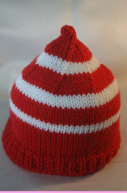 red and white beanie for a child
