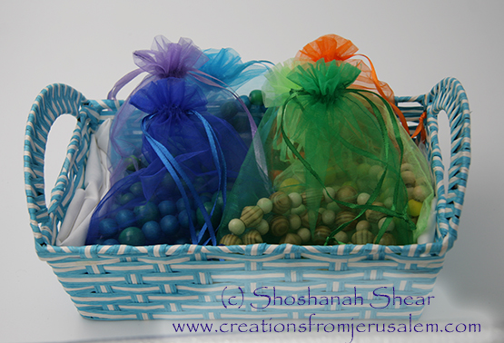 basket of wooden bead necklaces