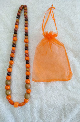 Orand and Brown wooden bead necklace with bag