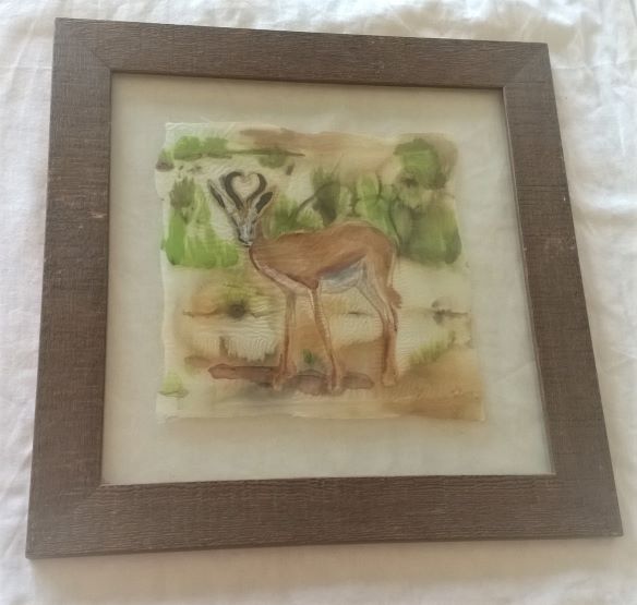 deer on silk floated in glass with wooden frame