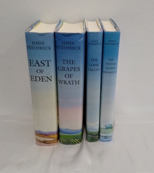 spine of Steinbeck set set 4 Steinbeck books seen from spine